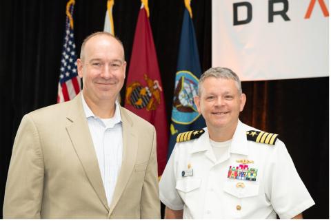 Draper President and CEO Dr. Jerry M. Wohletz and U.S. Navy Captain Jason Schneider
