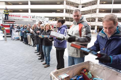 Draper held a toy brigade to transfer the toys to the Cambridge Fire Department for delivery to Toys for Tots. 